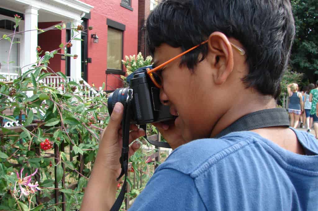 student using a camera